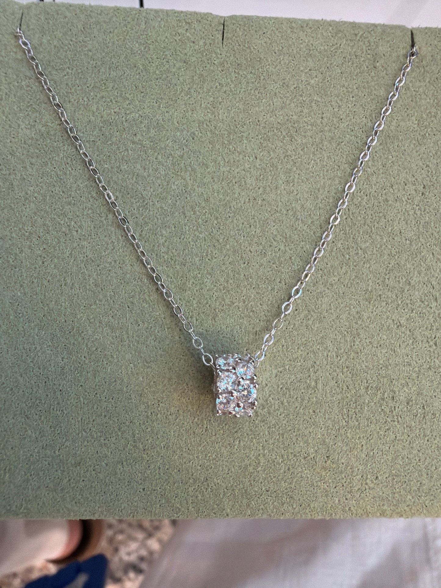 Silver rotary gem necklace